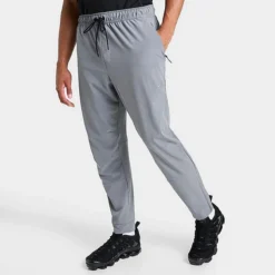 Men's Nike Dri-FIT Unlimited Tapered Leg Versatile Training Pants Smoke Grey/Black/Smoke Grey - FB7548 084